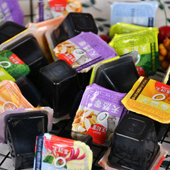 10 lbs box of raw Tangtang Guilinggao in bulk, wholesale snacks available in original, honeysuckle, rock sugar chrysanthemum, and rock sugar flavors.