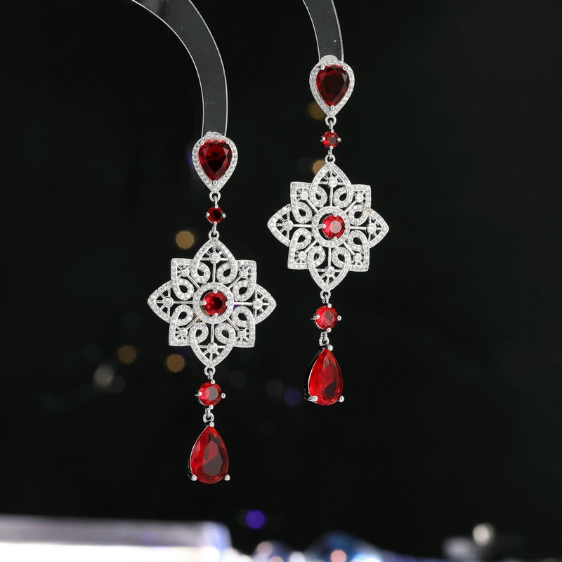 Light luxury high-end heavy industry earrings banquet dress with long hollow pattern water drop earrings_voghion.com