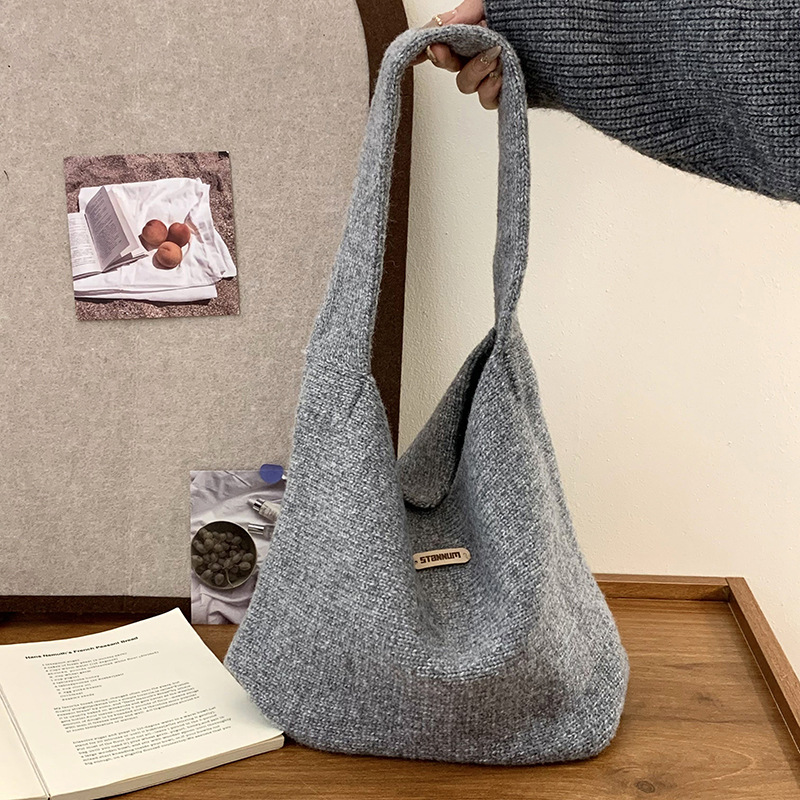 Bolsa de hombro de punto otoño y invierno nuevo estilo coreano simple color sólido temperamento de lana bolsa de mano bolsa de mochila