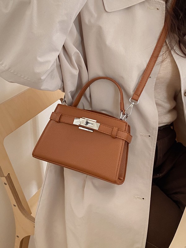 Bolso de mano de alto nivel de estilo occidental para mujeres 2026 nuevo retro nicho Kelly bolsa de viaje universal mochila de hombro