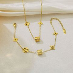 新しいスタイルの小さなウエスト、老眼、色褪せしない四つ葉の花のネックレスとブレスレット、ニッチなデザイン、軽い高級感、ハイエンドのファッションジュエリー