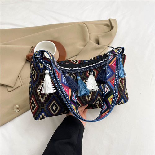Cross-border 2024 summer new ethnic style bag women's trendy crossbody bag wide shoulder strap women's bag foreign style tassel bucket bag