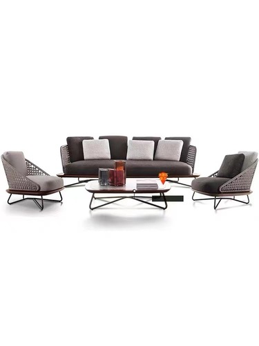 Nordic outdoor sofa and lounge balcony rattan chair and coffee table set of three, designer homestay courtyard hotel villa