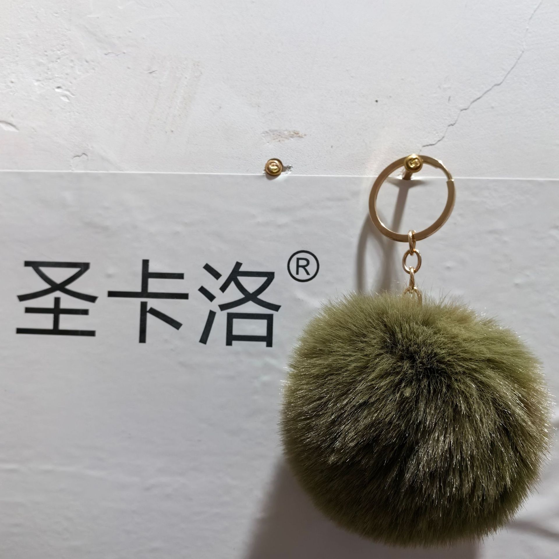 Elemento verde colgante cuerda llavero de peluche de piel artificial bolsa de lana corta colgante damas colgando bolsa accesorios al por mayor