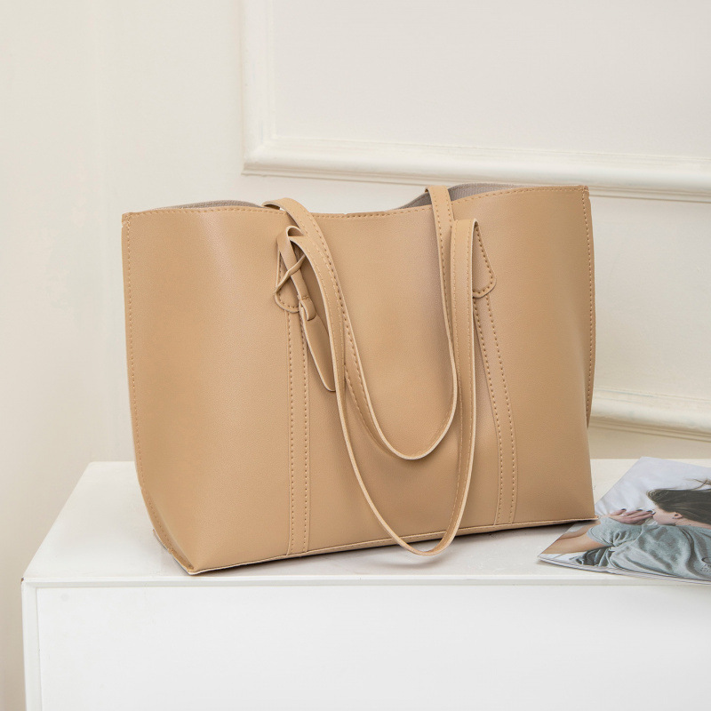 2025 otoño y invierno nuevo nicho Zhong tote bolso de cuero suave de gran capacidad para mujeres bolso de viaje de alta calidad bolso de hombro ocio