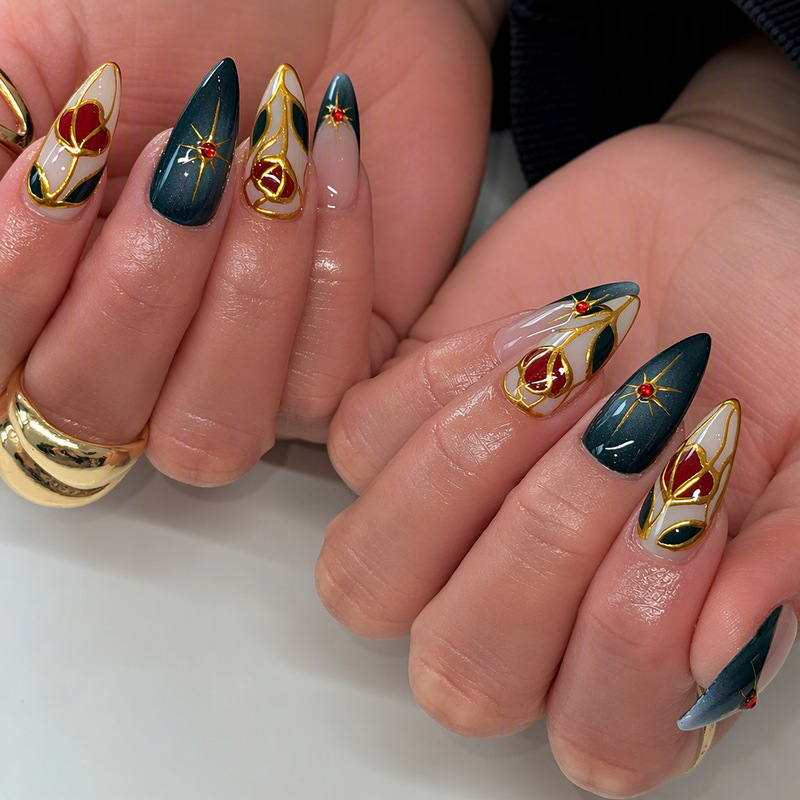 Wearable nail art, popular in Europe and America, featuring French-style hand-painted roses, dark green and red diamond accents, and gold trim; available for wholesale