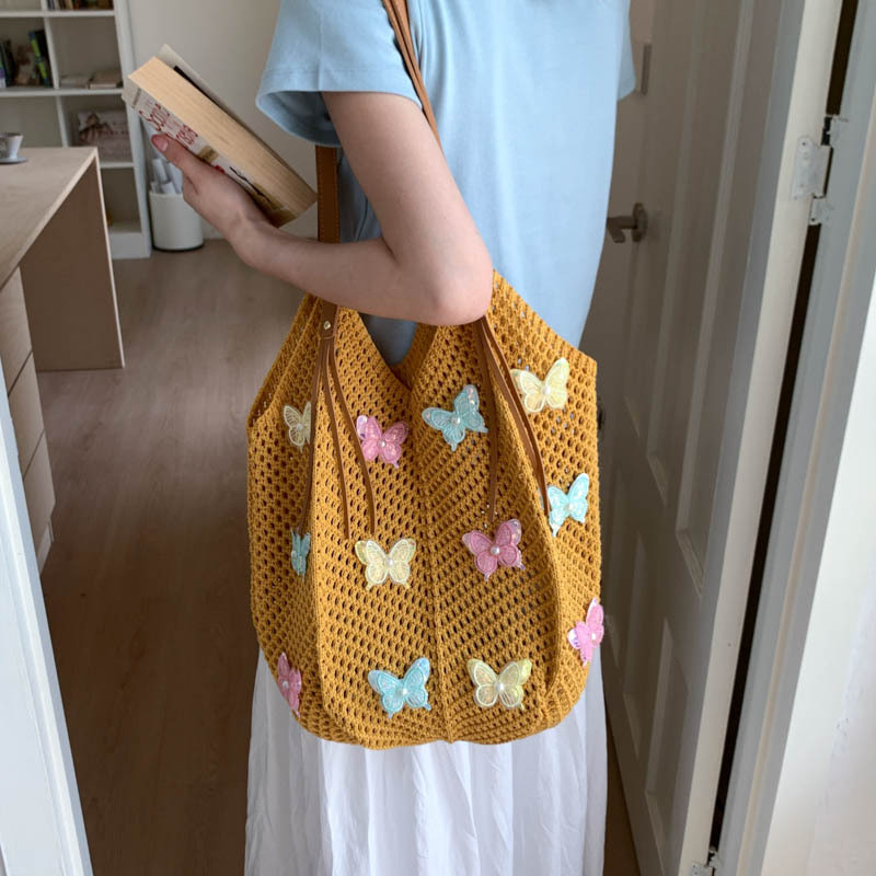 Bolso Tote de moda coreana 2025 verano nuevo bolso femenino bolso de mariposa de encaje bolso de hombro de punto de gran capacidad