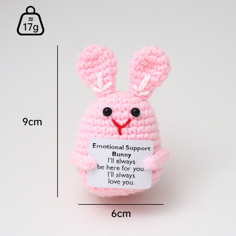 흰색 실로 꿰매어진 토끼 핑크색 귀