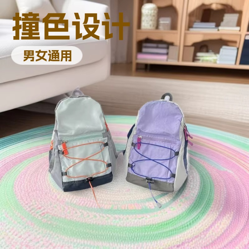 Mochila estilo japonés con bloques de color, mochila unisex para estudiantes, simple y ligera para viajes y uso diario.