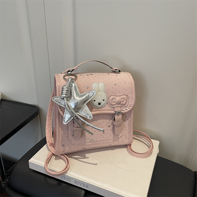 2026 verano nueva moda dulce simple bolso de hombro pequeño nicho dibujos animados conejo mochila de hombro casual mujer