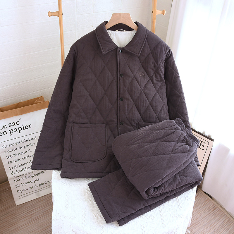 秋冬の新型の厚手の純綿カップルのパジャマの女性は綿の綿入れの服を挟んで冬の保温の簡単な家庭服のスーツの卸売りをします。