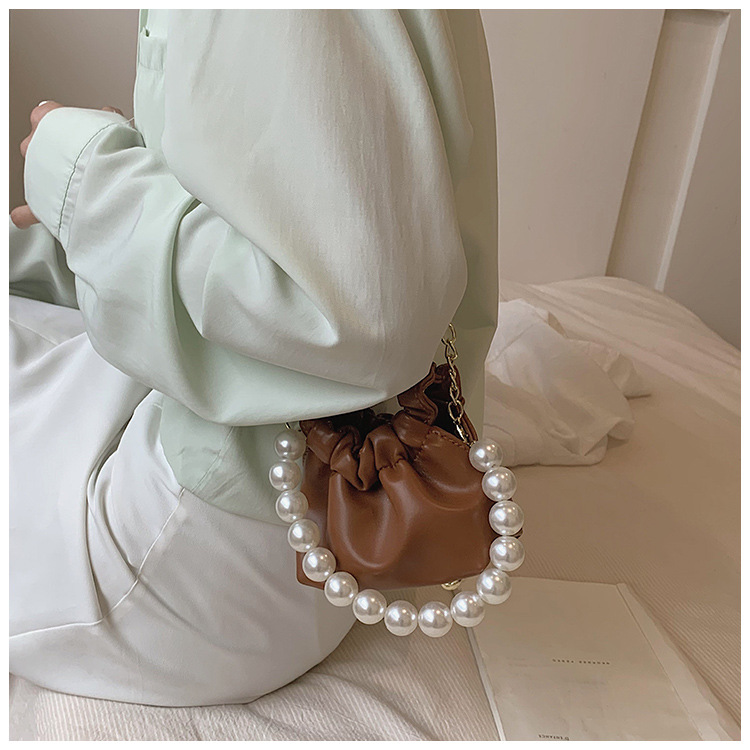 255g Weight Beading, Pearls Fashion Element Clasp Frame Closure Type Top Handle, Chain Strap Type Crossbody Bag Bags Type Casual, Daily, Shopping Occasion Pu Leather Material Solid Color Pattern All Seasons Season Kid'S Gender Cute Style Bucket Shape Kid'S Pu Leather Solid Color Cute Beading Pearls Bucket Clasp Frame Crossbody Bag 30