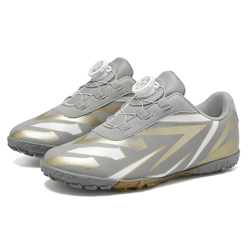 Baochuan nuevo zapato de fútbol transpirable para niños botón giratorio para niños TF clavos rotos zapatos de entrenamiento de fútbol transfronterizos