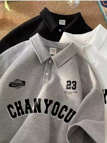 Summer polo collared shirt for men and women, loose oversize retro printed design style, niche trendy brand short sleeve