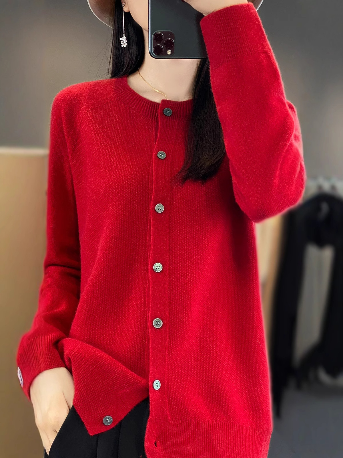Woolen knitted sweater with a round collar