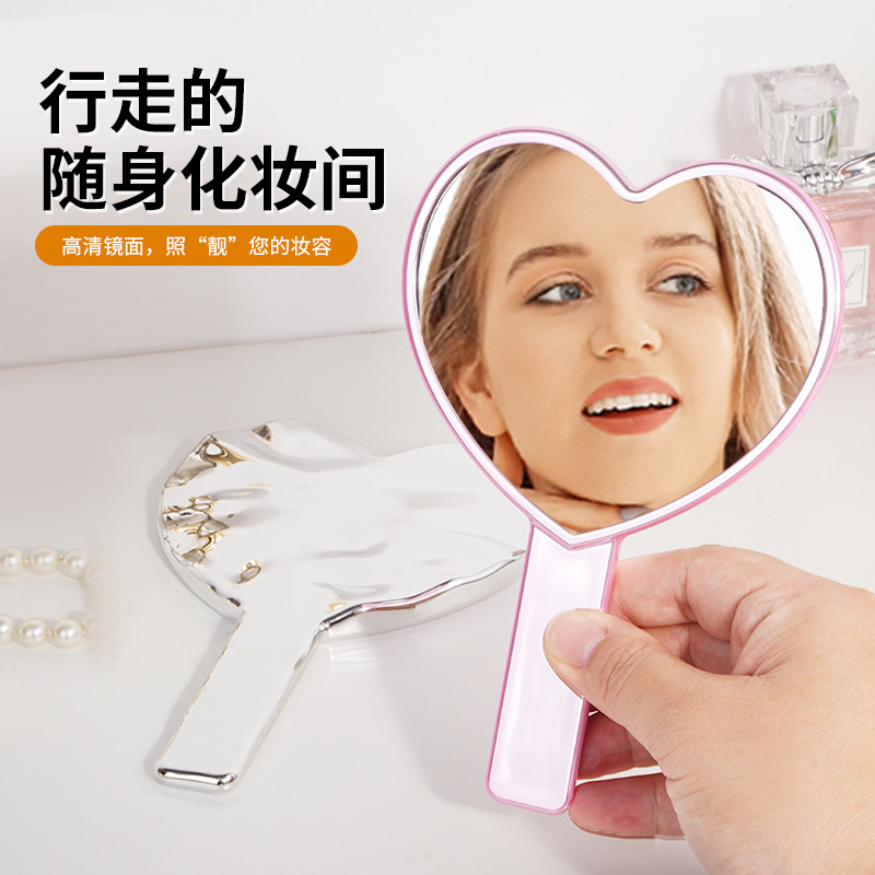国境を越えたアマゾン愛メッキ鏡携帯少女は洗練されたかわいい高解像度鏡面化粧鏡を持っている|undefined