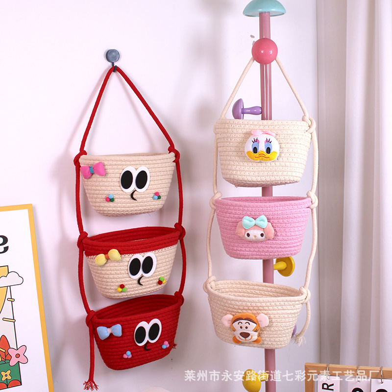 Cesta organizadora de cuerda de algodón con diseño de dibujos animados para colgar en la puerta del dormitorio, se puede usar como cesta de almacenamiento o cesta colgante.