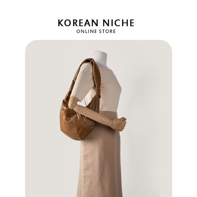 2024 New Korean niche design soft leather pleated shoulder armpit, suitable for women's versatile commuter bags_voghion.com