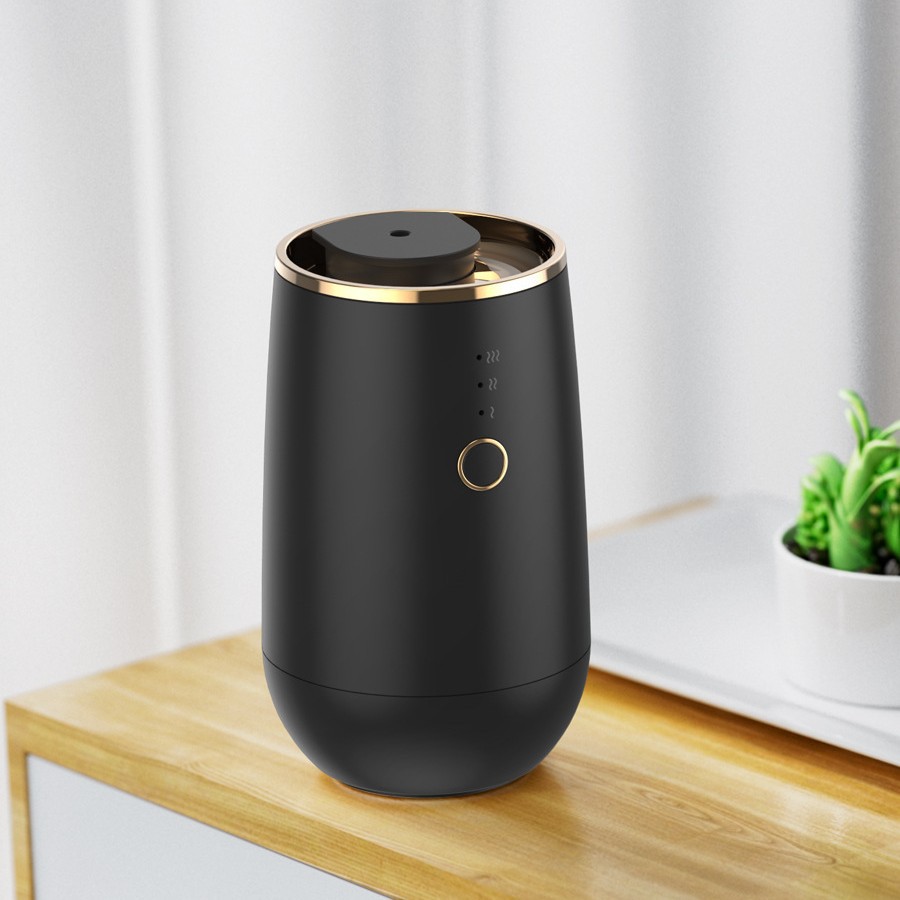 Venta al por mayor aceite esencial máquina de aromaterapia de coche pequeño pulverizador de fragancia USB máquina de fragancia de batería de litio máquina de fragancia portátil expansor de fragancia