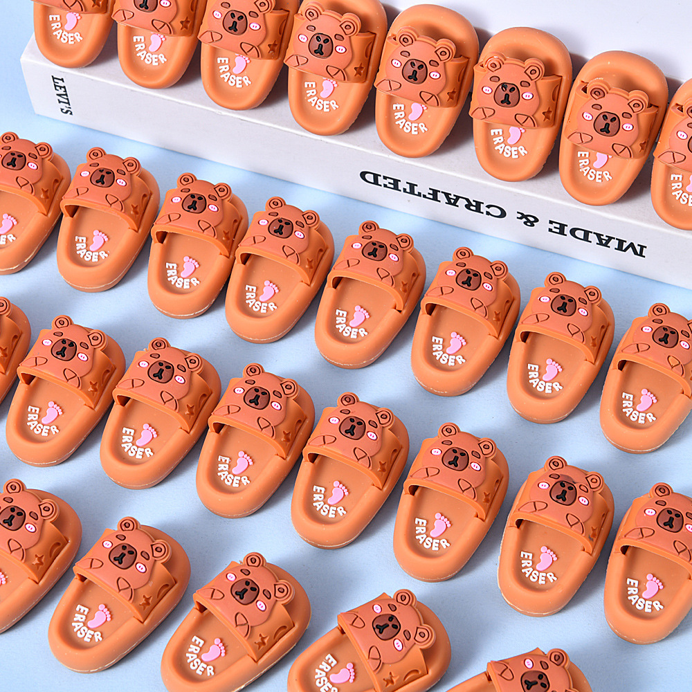 Creativo lindo zapatillas de estilo estudiante borracha mini dinosaurio Sanli borracha borracha limpia borracha mayorista