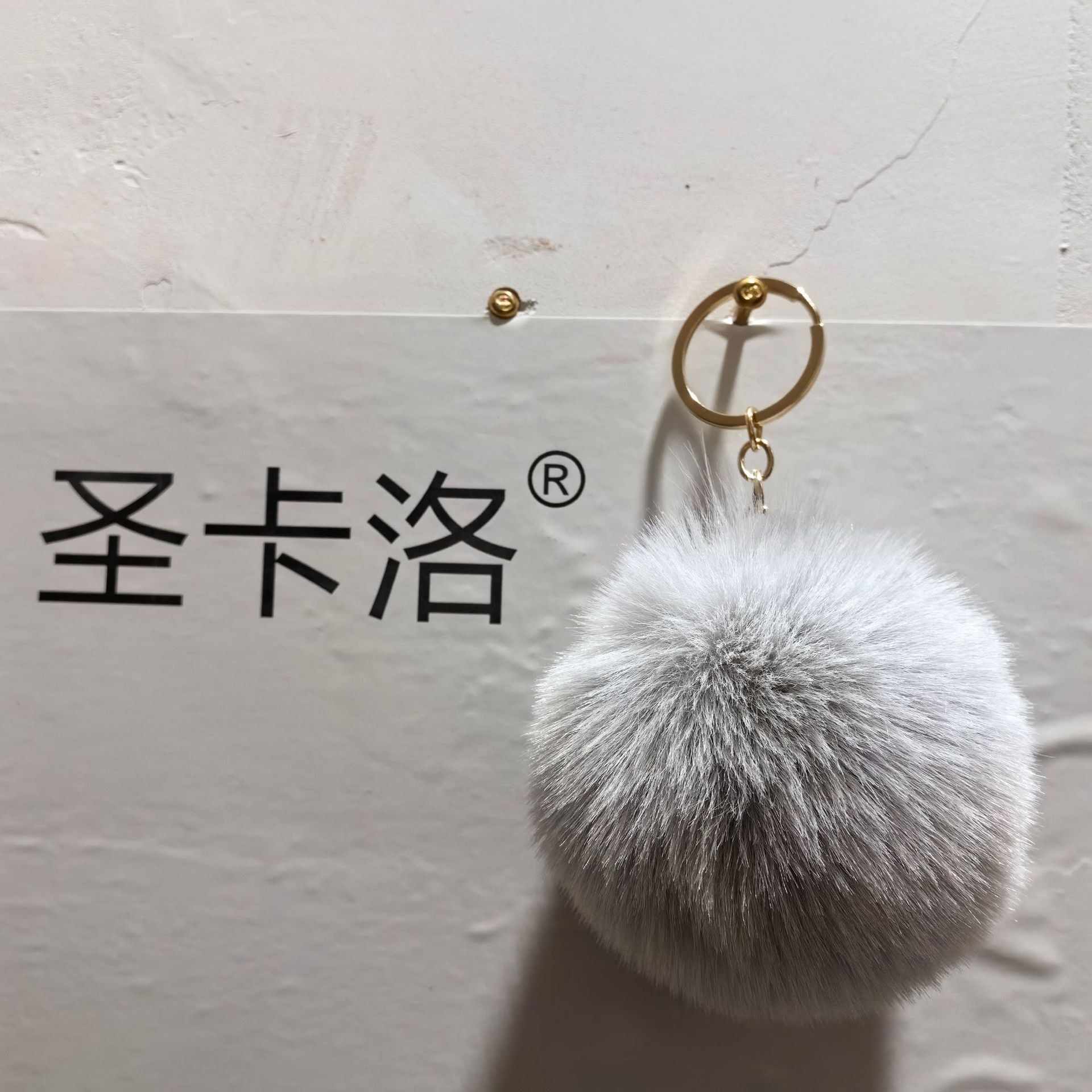 Elemento verde colgante cuerda llavero de peluche de piel artificial bolsa de lana corta colgante damas colgando bolsa accesorios al por mayor