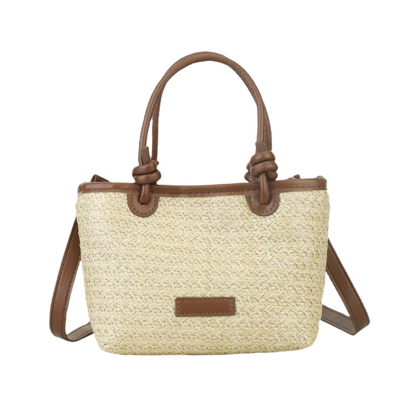 Bolso tejido estilo playa de vacaciones de primavera y verano bolso de mensajero portátil 2025 nuevo estilo nudo de cuerda de aire extranjero bolso de canasta de verduras bolso tejido
