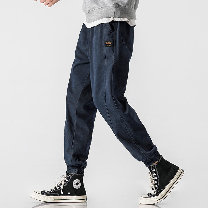 Monos de marca de moda Primavera y otoño de los hombres nuevos pantalones casuales atados al tobillo estilo coreano sueltos Pantalones deportivos flacos de moda para todos los partidos