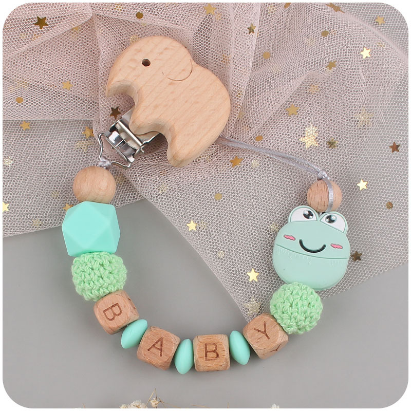 Suministros para bebés dibujos animados animal Rana pájaro mordedor chupete cadena calmante bebé mordedura molar cadena anti-caída