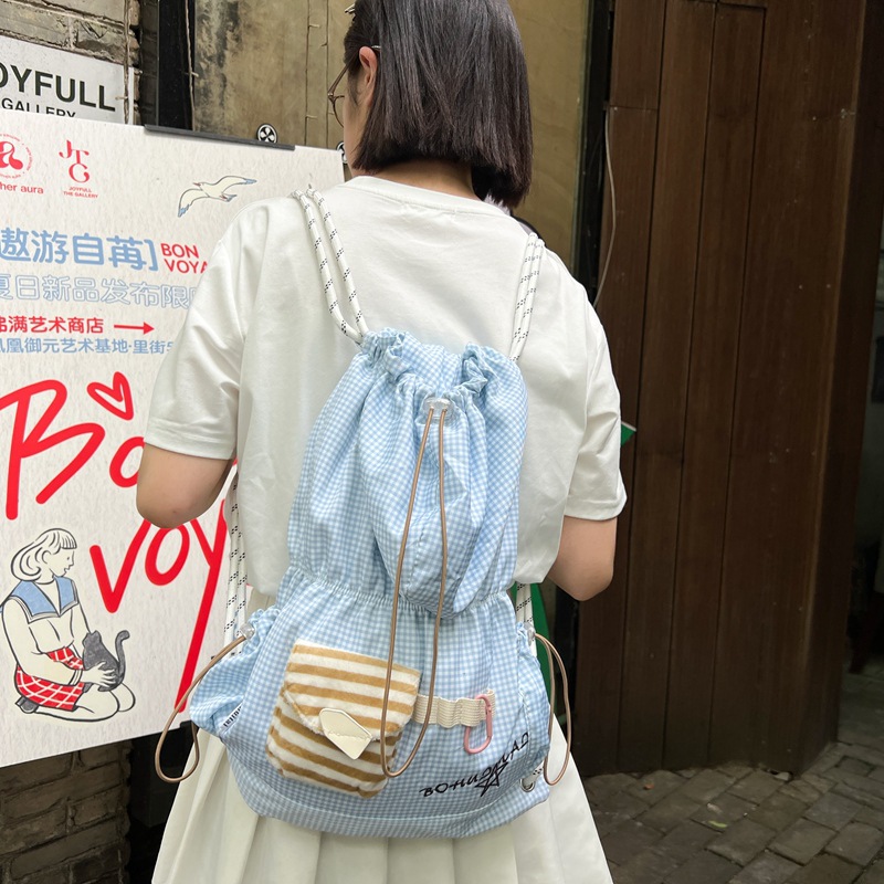 2025新款日韩小众设计森系尼龙布抽绳女士双肩包轻便上课旅游背包