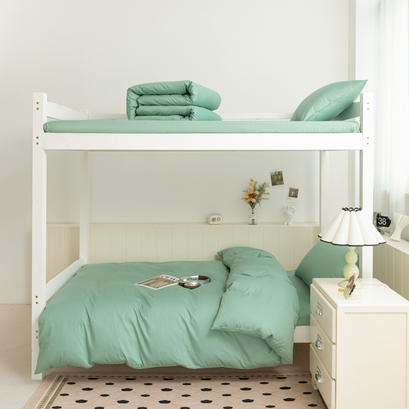 Cama de algodón de color puro para estudiantes universitarios de tres piezas dormitorio de algodón puro sábana individual funda de edredón ropa de cama 2025 nuevo estilo