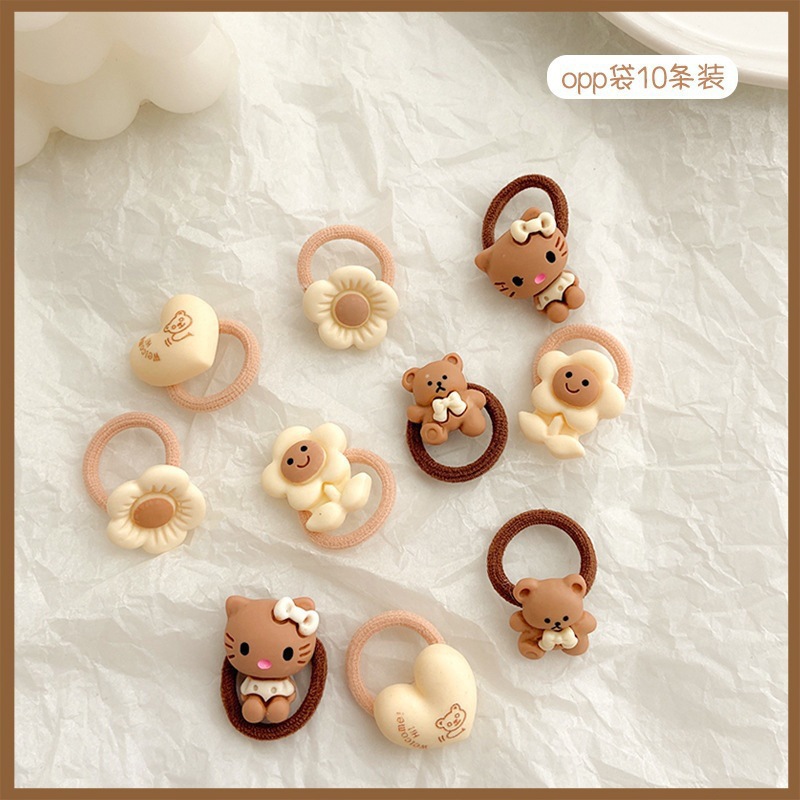 La banda de goma marrón leche simple y Linda para las mujeres no duele la banda del pelo de la cuerda del pelo de la cola de caballo del tamaño pequeño para las mujeres