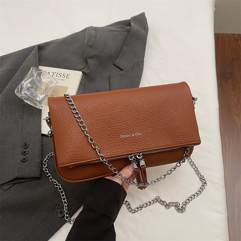 High-value fashion chain texture shoulder mochila 2026 primavera nueva bolsa casualizada coreana temperamento femenino