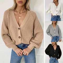 秋冬の欧米のクロスボーダーの婦人服の新型のセーターの女性の純色の深いvネックの灯籠の袖のボタンのゆったりしているニットのカーディガン