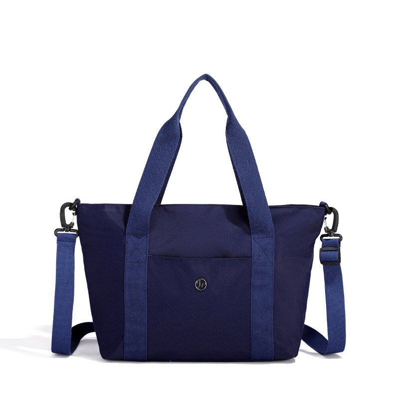 Primavera nueva bolsa de viaje impermeable de gran capacidad de alto valor, bolsa diagonal de un solo hombro para mamá de compras portátil de moda