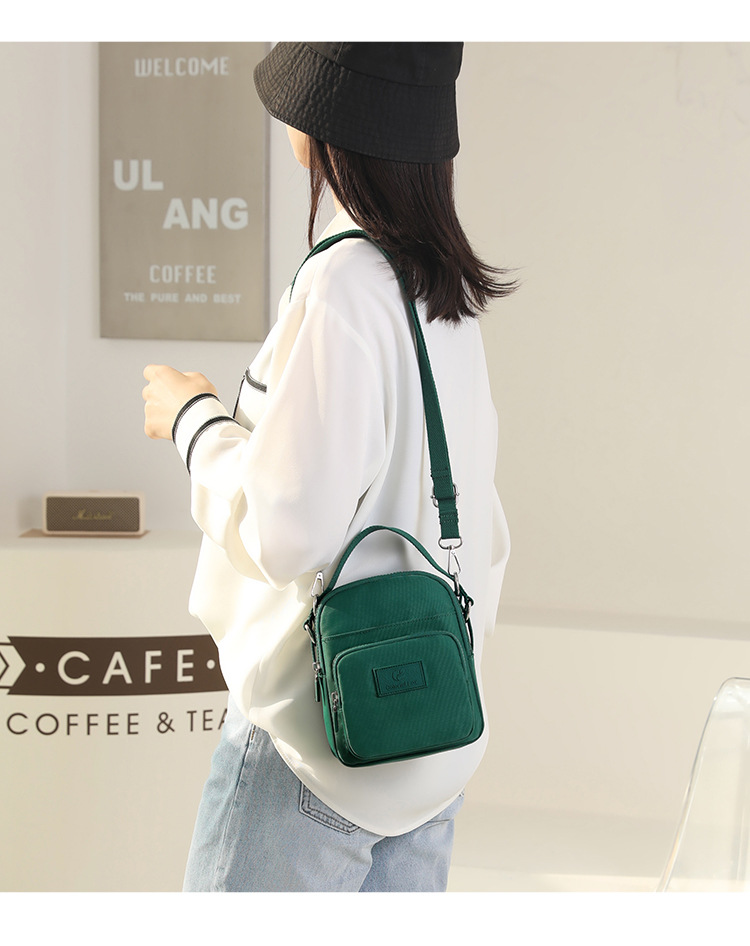 2025 New fashionable and trendy single-shoulder bag for women, outdoor casual, mobile phone key, coin purse, water-resistant nylon bag undefined