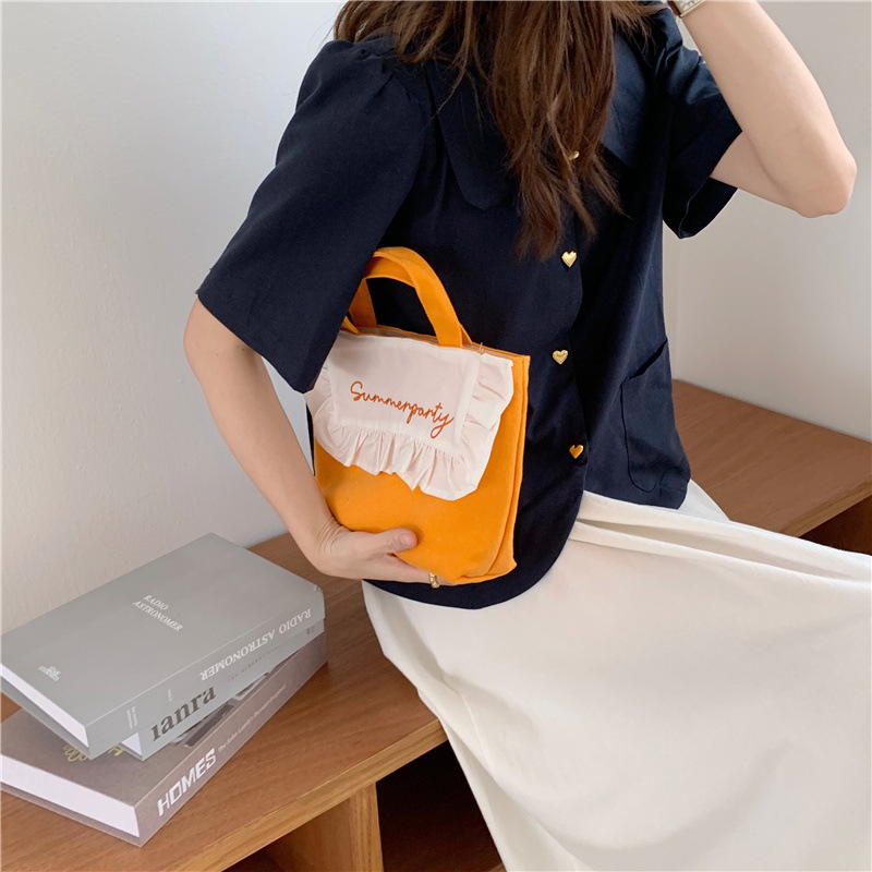 1441 Japanese and Korean chic Sweet ruffled bento Bag, Fresh embroidered hand-held small cloth bag, girl student bag wholesale undefined