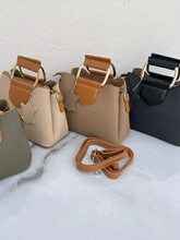 HandbagsŮʿ������r�п�؛Դ���lBags wholesale�������l