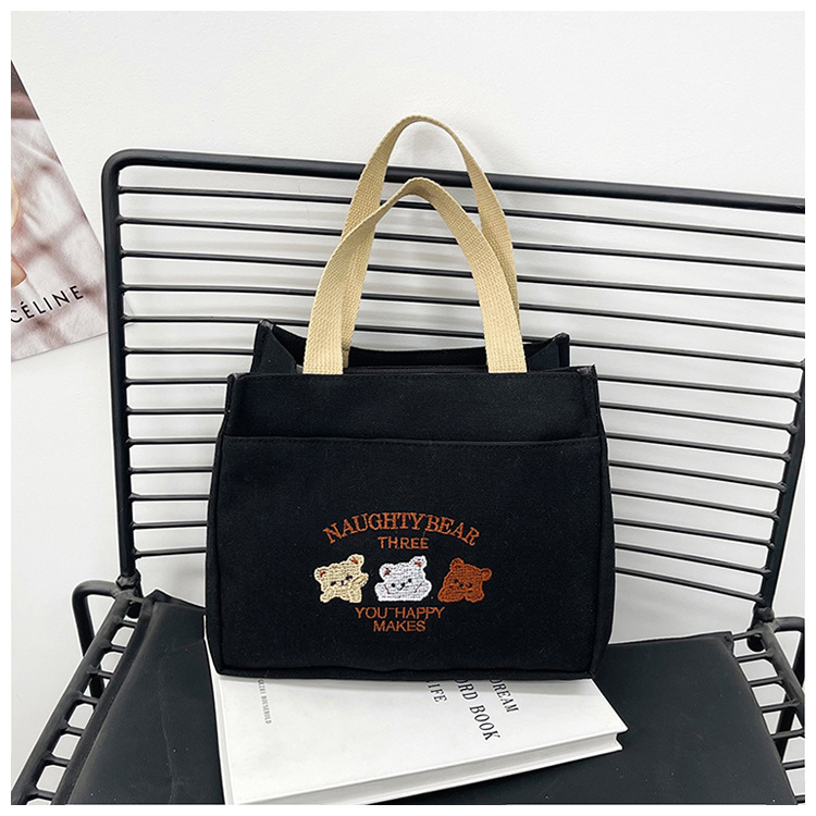 New wholesale fashionable and high-quality canvas handbag, simple and portable, easy to carry for going out, versatile lunch box and bento bag undefined