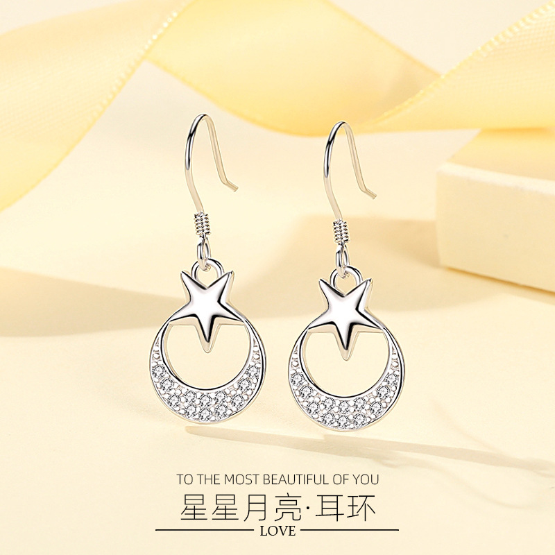 S925 nuevo estilo coreano pendientes de plata estrella Luna personalidad transfronteriza europea y americana pendientes de moda joyería al por mayor