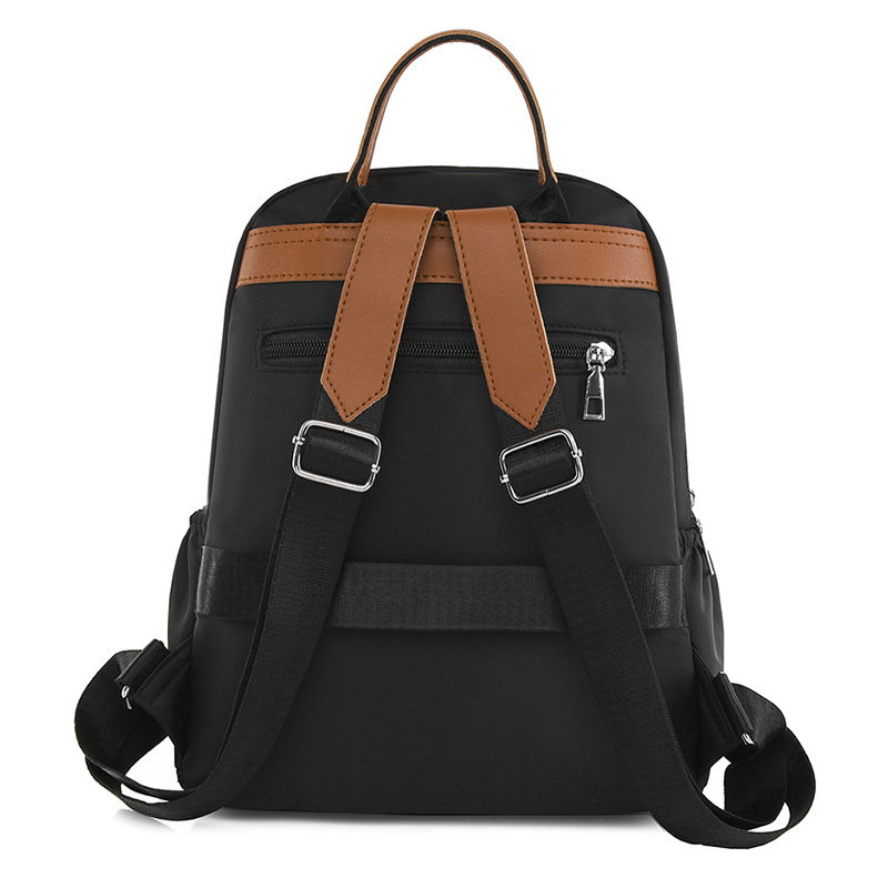 Comercio exterior al por mayor 2023 nueva mochila de tela Oxford para mujer retro casual, bordado de moda, mochila de viaje ligera