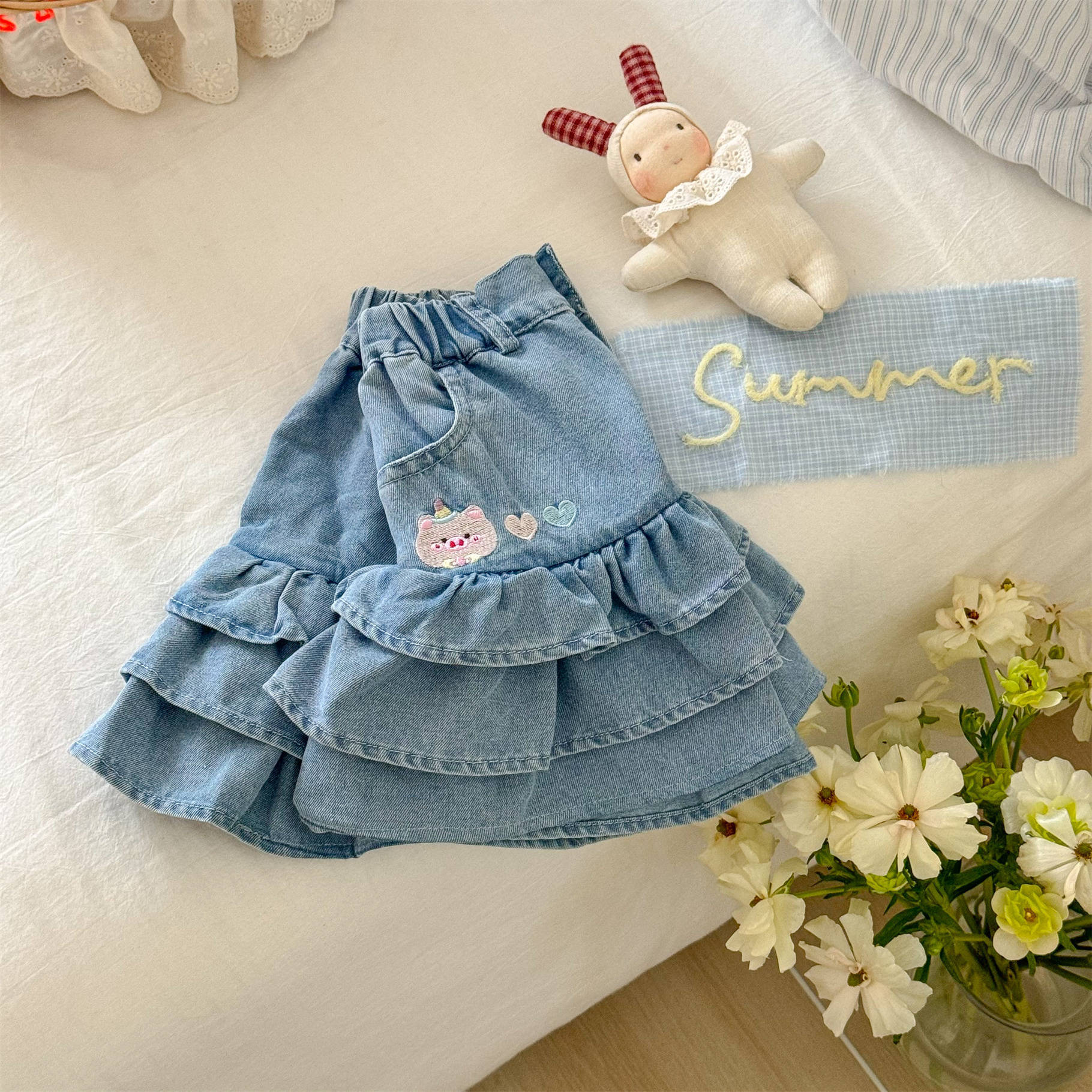 Niña redonda estrella infantil falda corta de mezclilla verano fino nuevo estilo femenino bebé ropa exterior falda caliente de cinco puntos para niños marea