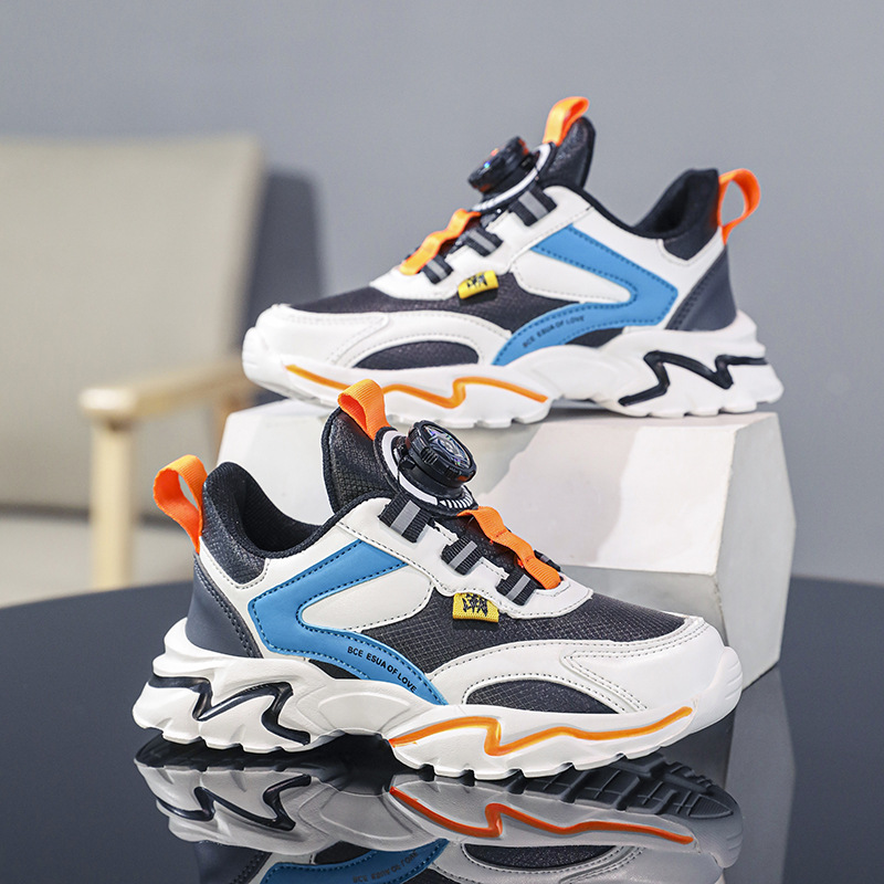 Zapatos infantiles para niños zapatos deportivos primavera y otoño nuevos zapatos de botón impermeable de cuero para niños zapatos de papá mayorista