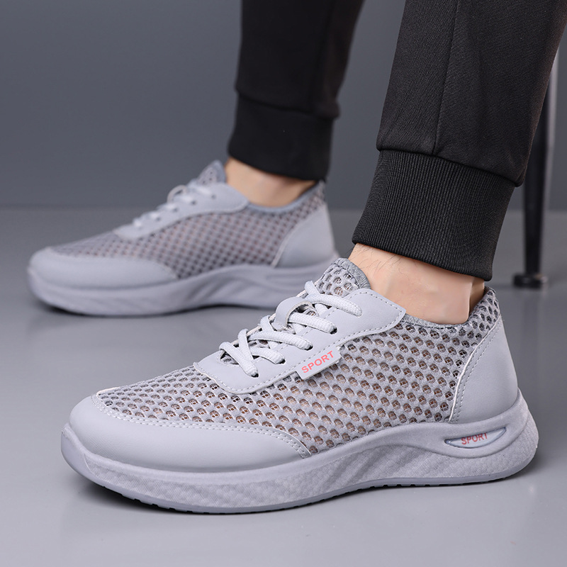 Zapatos de hombre de verano nuevos zapatos casuales respirables de malla hueca ligera suave simple zapatos deportivos al por mayor
