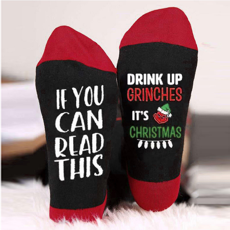 Calcetines de Navidad calcetines de algodón casuales de hombres y mujeres Amazon transfronterizo letras inglesas cara de fantasma calcetines transpirables de media pantorrilla en stock