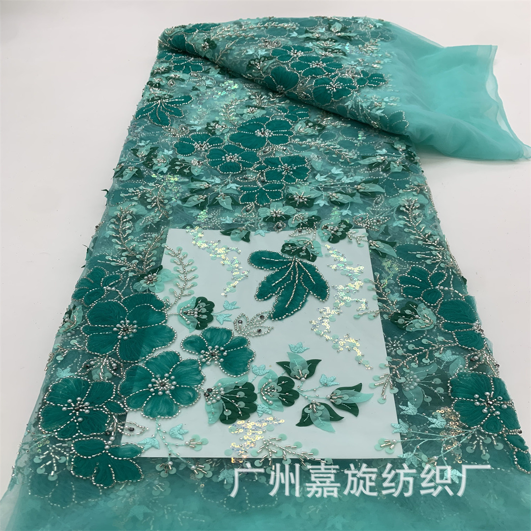 Tela de encaje con cuentas de estilo europeo y americano con diseño floral láser para vestidos de noche y trajes de lentejuelas para escenario. Encaje hecho a mano.