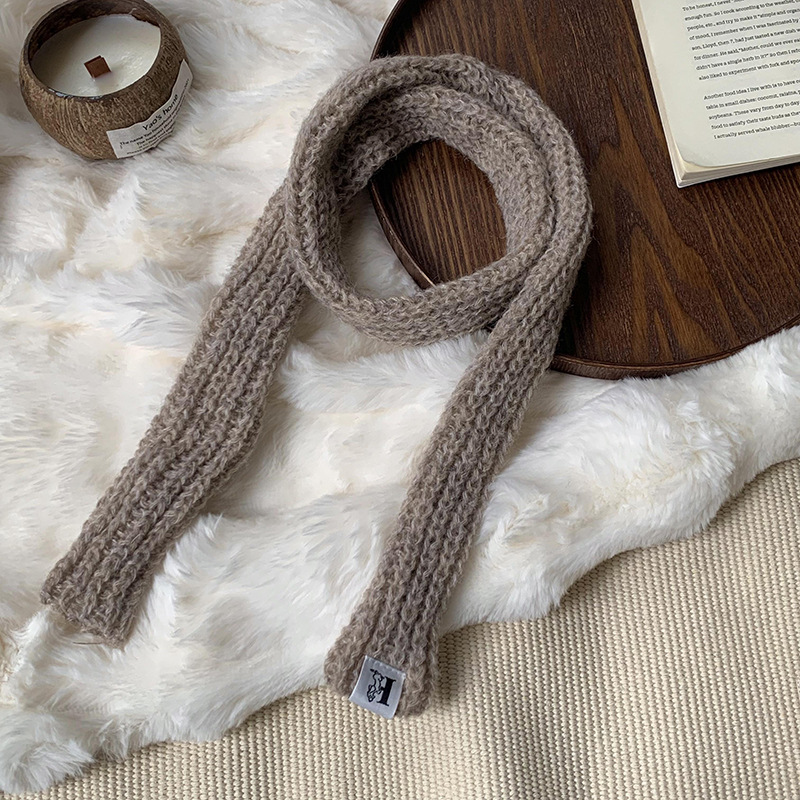 Otoño y invierno bufandas mujeres 2025 nuevo color sólido caliente de protección de cuello de lana de punto largo bufandas al por mayor