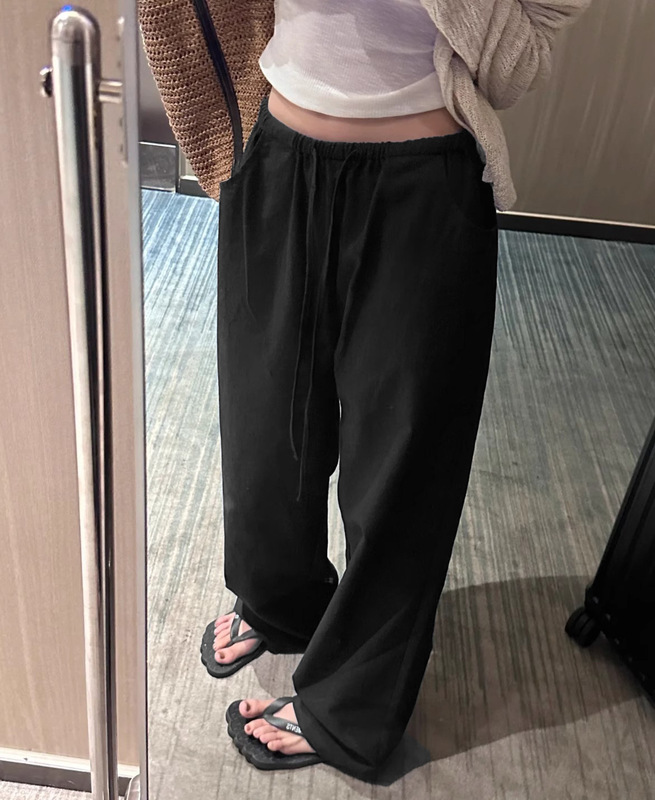亜麻のワイドパンツの女性の夏の薄いタイプの高腰の垂れ下がった感がゆったりしていて、やせています。|undefined