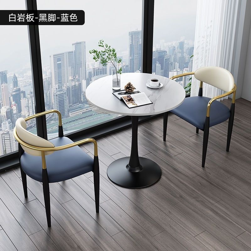 Black legs + white rock slab + blue leather, one table and two chairs