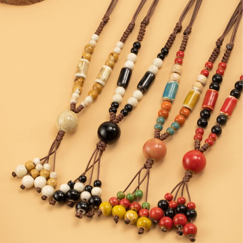 Europe and the United States cross-border retro ethnic style Joker ceramic Bohemian necklace women tassel sweater chain ornaments wholesale