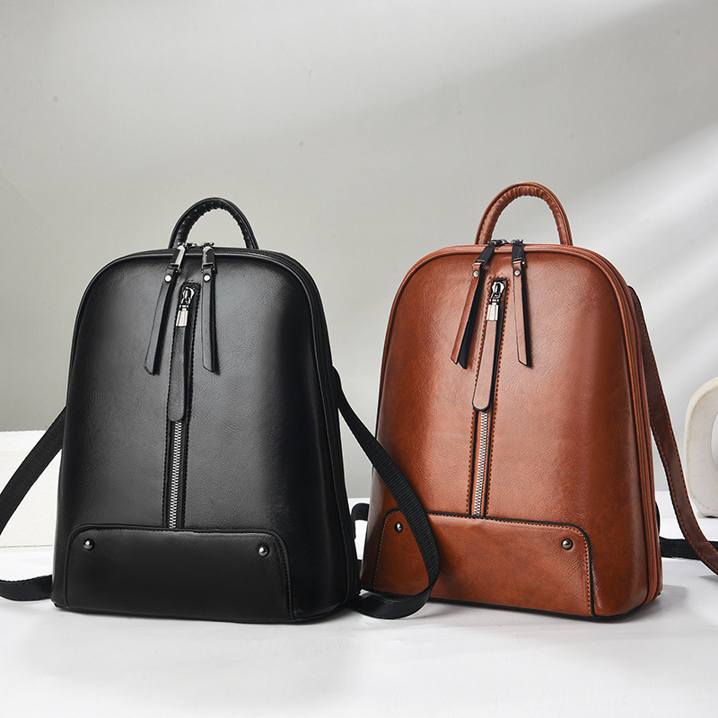Mochila para mujeres 2025 nueva moda retro mochila de cuero de aceite de gran capacidad, mochila de damas ligera, bolsa de viaje universal